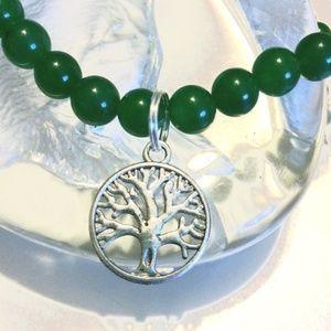 A Green Jade Beaded Necklace with a Tree of Life